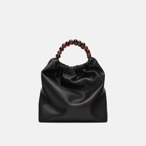 Zara Accessories - Zara black bucket bag with round handles